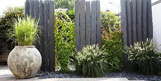 Sichtschutz Palisaden Stein Steinsichtschutz Zaun Pflanzen Grun Blumentopf Garten Gartengestaltung Gartensichtschutz Sichtschutz Garten Zaun Palisaden