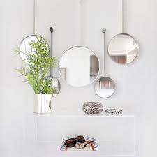 Hang Multiple Mirrors For A Dramatic Effect Mirror Wall Living Room Mirror Wall Bedroom Lighted Wall Mirror
