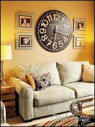 Image Result For Wall With Clock In Middle And Frames On Side Wall Clocks Living Room Living Room Clocks Home Decor