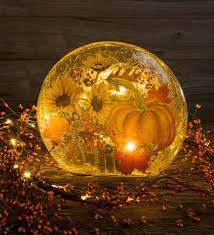 Light Up Your Fall Season With Our Lighted Sunflowers And Pumpkin Glass Decor This Festive Accent Will Add A Soft Glowing Ambi Glass Decor Candle Decor Decor