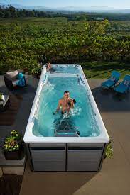 The Magic Is In The Machine Nwhotspring Com Swim Spa Endless Pool Hot Tub Swim Spa