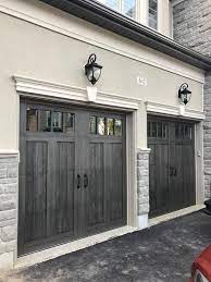 Faux Wood Garage Doors Clopay Canyon Ridge Photos Revie Faux Wood Garage Doors Clopay Canyon Ridg In 2020 Haus Aussenfarben Garagentor Farben Aussenwandfarbe