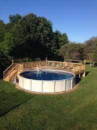 Above Ground Pool Deck For 24 Ft Round Pool Deck Is 28x28 Best Above Ground Pool Pool Landscaping Above Ground Swimming Pools
