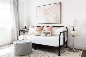 Pink And Gold Abstract Art Over Black Daybed Transitional Bedroom Mongolian fur pillows are my accent pillows and throws can be swapped out each season to keep your rooms looking fresh and current.