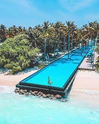 25 Best Hotel Swimming Pools In The World Hotel Swimming Pool Amazing Travel Destinations Luxury Resort