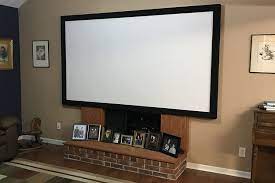 Home Theater In A Living Room Everything You Should Know Other ideas include building in platforms that raise a level to install home theater seating and home theater furniture.