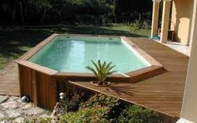 Der Oberirdische Pool Aus Holz 50 Modelle Archzine Fr Dekoideenwand Oberirdischer Pool Holzpool Schwimmbad Landschaftsbau