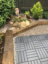 Rockery In Our Small Garden Using Ikea Runnen Decking And Wooden Railway Sleepers Garden Floor Small Garden Small Gardens
