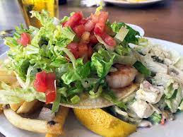 Located on the business corner in paia, people watching is at its finest. First Look PaÊ»ia Fish Market Opens In Waikiki With The Best Kind Of Happy Hour Honolulu Magazine