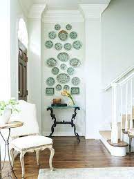 20 Creative Ways To Display Your Favorite Artwork Plates On Wall Home Decor Plate Wall Display