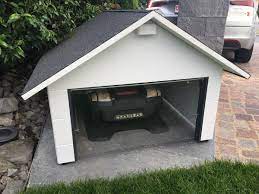 Switzerlands Coolest Robot Lawn Mower Garage For Husqvarna Automower 310 315 420x 430x 450x With Solar Pow Robotic Lawn Mower Lawn Mower Lawn Mower Cover