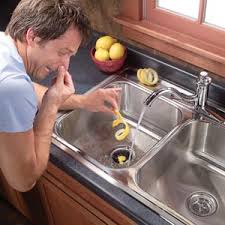 plumber for a smelly garbage disposal