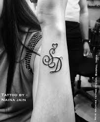Awesome Couple Tattoo Initials S And D For Beautiful Couple Tattoo Designed By Naina Jain N Couples Tattoo Designs Matching Couple Tattoos Trendy Tattoos