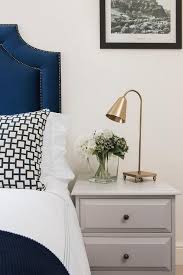 Blue Velvet Headboard And Gray Nightstand Transitional Bedroom Sophisticated Bedroom Blue Bedroom Walls Dark Blue Bedroom Walls