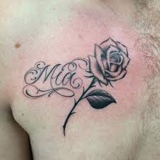 Most tend to believe the rose, a beautiful, bright flower, symbolizes beauty or is a representation of our love lives. 40 Memorable Name Tattoos Rose Tattoo With Name Boyfriend Name Tattoos Name Tattoos For Girls