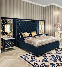Art Deco Bedroom With Stripes Wallpaper With Navy Blue Bed Frame And Luxury Bed Sheet Glamorou Bedroom Furniture Design Luxurious Bedrooms Bedroom Bed Design