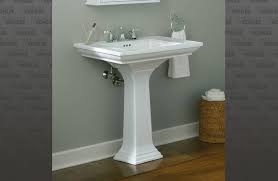 white fire clay pedestal sink