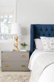 The Perfect Pair Navy Gold Bedroom Makeover Blue Headboard Gold Bedroom