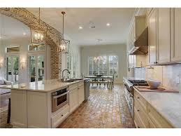 76 Orchid Ln Mandeville La 70471 Brick Floor Kitchen Mediterranean Homes Brick Kitchen