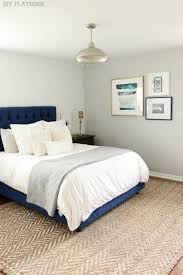 A Navy Headboard Neutral Rug For The Win Diy Playbook Bedroom Interior Home Bedroom Simple Bedroom