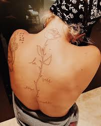 Lady Gaga La Vie En Rose Back Tattoo Lady Gaga Tattoo Back Tattoo Celebrity Tattoos