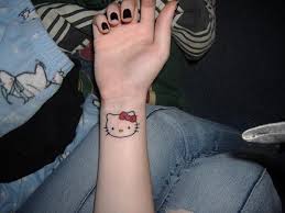 Hello kitty tattoo idea site #3: 25 Pretty Hello Kitty Bow Tattoo Designs Slodive