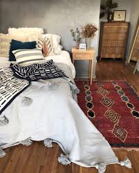 Vintage And Handmade Home Decor Thoughtfully Sourced From Around The World Shop Our Co Moroccan Pom Pom Blanket Vintage Bedroom Decor Vintage Inspired Bedroom