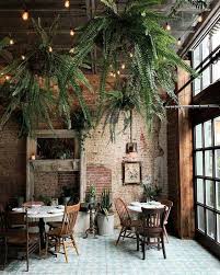 21 Amazing Ways To Decorate With Plants In 2020 Rustic Cafe Coffee Shop Decor Cafe Interior Design