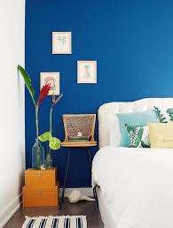 Oklobsessed Tropical Leafy Looks We Love Blue Bedroom Walls Blue Walls Living Room Bright Blue Bedrooms