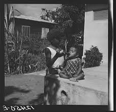 1937 Black Milk This Baby Is Getting A Mixture Of Coffee Sugar And Water Instead Of Milk Which Is Too E Puerto Rico History Puerto Rican Culture Puerto Rico