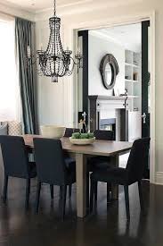 Transitional Dining Room Kelly Deck Design Black Dining Room Black Upholstered Dining Chairs Wood Floor Dining Room