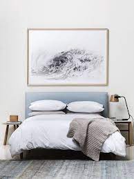 Bedroom Styling Gorgeous Powder Blue Upholstered Bed White Bedding Oversized Art Above Bed Mismatche Bedroom Art Above Bed Bedroom Artwork Decor Over Bed