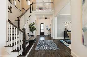 Two Story Foyer White Foyer With Hardwood Floors The Sorenna Floor Plan Drees Custom Homes Houston Foyer Design Foyer Decorating House Design