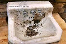 remove stains from an old cast iron sink