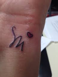 Pin By Maranda Phasionqueen On Tattoos Tattoo Lettering Letter Tattoos On Hand Tattoos For Kids