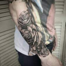 Pin By Jenn On Tattoo Men Flower Tattoo Rose Tattoos For Men Rose Tattoo Sleeve