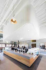 A Combination Of Coffee And Cocktail Bar Has Arrived In Texas Modern Coffee Shop Cocktail Bar Design Coffee Shop Design