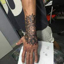 200 Mystical Mandala Tattoos Meanings Ultimate Guide 2020 Mandala Hand Tattoos Wrist Tattoos For Guys Mandala Wrist Tattoo