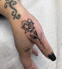 Black Rose Tattoo Inked On The Right Thumb Rose Tattoos For Women Thumb Tattoos Neck Tattoo
