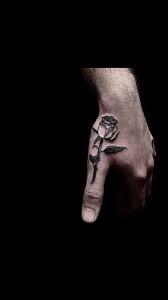 Pin By Maddie On Eye Catching Tattoos For Guys Hand Tattoos For Guys Thumb Tattoos Rose Tattoos For Men