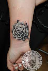 Rose Tattoos Meaning Placement Ideas Our Guide Rose Tattoos On Wrist White Rose Tattoos Tattoos