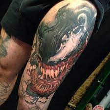 20 Coolest Comic Book Inspired Tattoos Venom Tattoo Comic Book Tattoo Book Inspired Tattoos