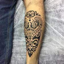 Tribal Leg Tattoo Simple Tattoos For Men Leg Rested On A Table Covered In White Paper Tatuaggi Per Uomini Tatuaggi Tatuaggi Maori