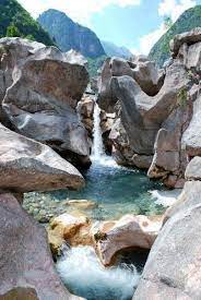 The Valbona River Is Justly Famous For Its Dramatic Gorges And Plunging Waterfalls As Well As For The Clari Albania Travel Visit Albania Cool Places To Visit