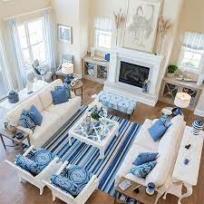 If You Decorate Using Colour Psychology As Your Guide Book You Will Know That Blue Is A Colour Living Room Furniture Arrangement Blue Rooms Coastal Living Room