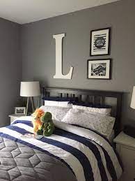 Navy Blue Gray And White Boy Bedroom For My Not So Little Guy Paint Color Is Storm By Benjamin Moore Small Room Bedroom Boys Bedroom Grey Boy Bedroom Design
