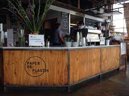 Stylish Industrial Design That Screams Artistry Paper Or Plastik Cafe S Appeal Come From Its Industrial Interior Cafe Counter Design Industrial Coffee Shop