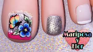 Una vez cortadas, lima las uñas en forma cuadrada evitando que queden picos. Diseno De Pie Flor Y Mariposa En Colores Alegres Unas Decoradas Para Pie Mariposa Y Flor Youtube