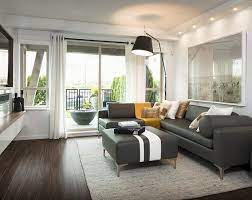 Dark Wood Floor Living Room With Contemporary Sofa Design And Standing Lamps Living Room Wood Floor Living Room Hardwood Floors Elegant Living Room Design