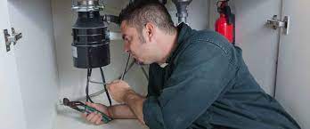 garbage disposal leaking from bottom